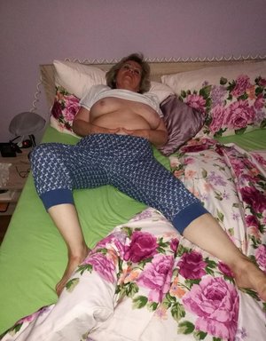 18 year old female Chloe Dash undressing on yoga mat on lawn